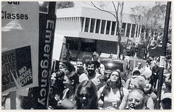 Students marching through campus in protest of fee increases