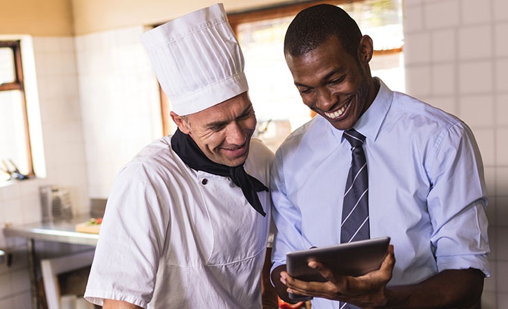 Restaurant manager working with chef