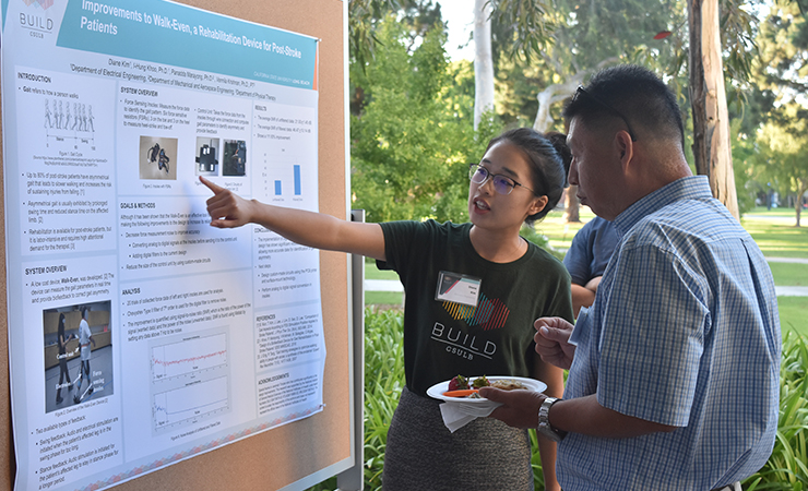 Year One Scholar Do (Diane) Kim shares her research with Dr.