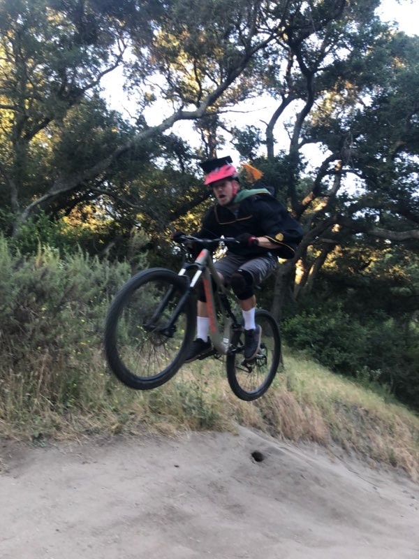 img_2907.jpg Kinesiology Grad on Bike