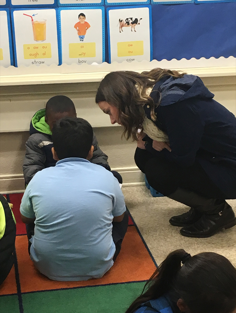 Student teacher Alayna Grapel answers students’ questions.