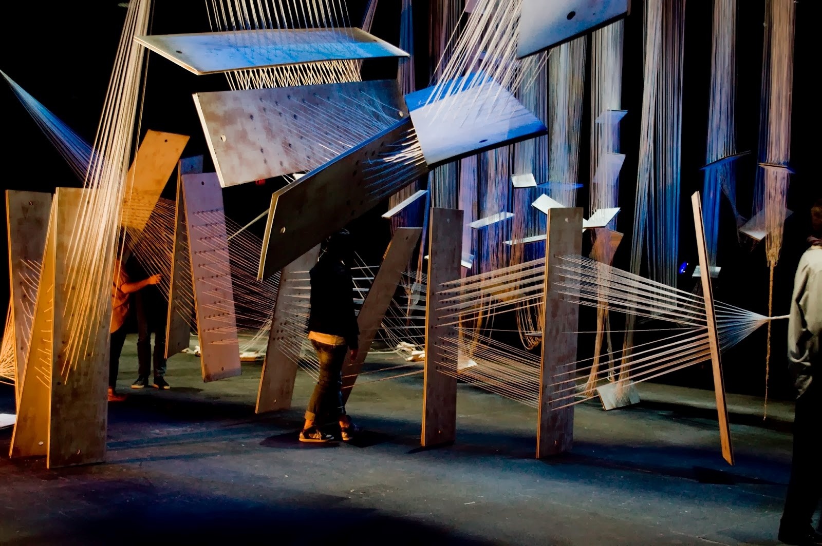 Immersive tactile installation of strings and light where au