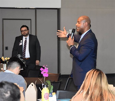 malo.jpg Dr. Malo Hutson speaking at the 2019 Symposium