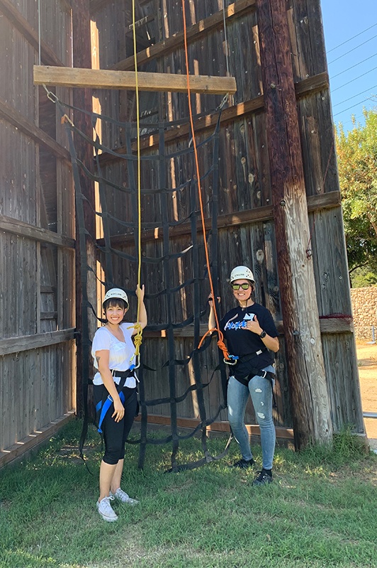 Zoe and Luz on wall climb