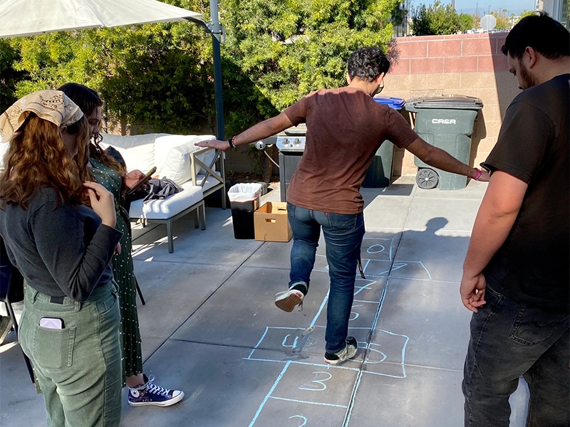 metric_holiday_21_08.jpg playing hopscotch