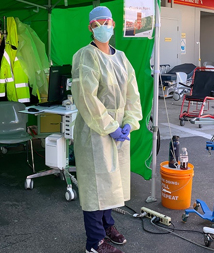 nurse tassia trink shows protective gear she wears