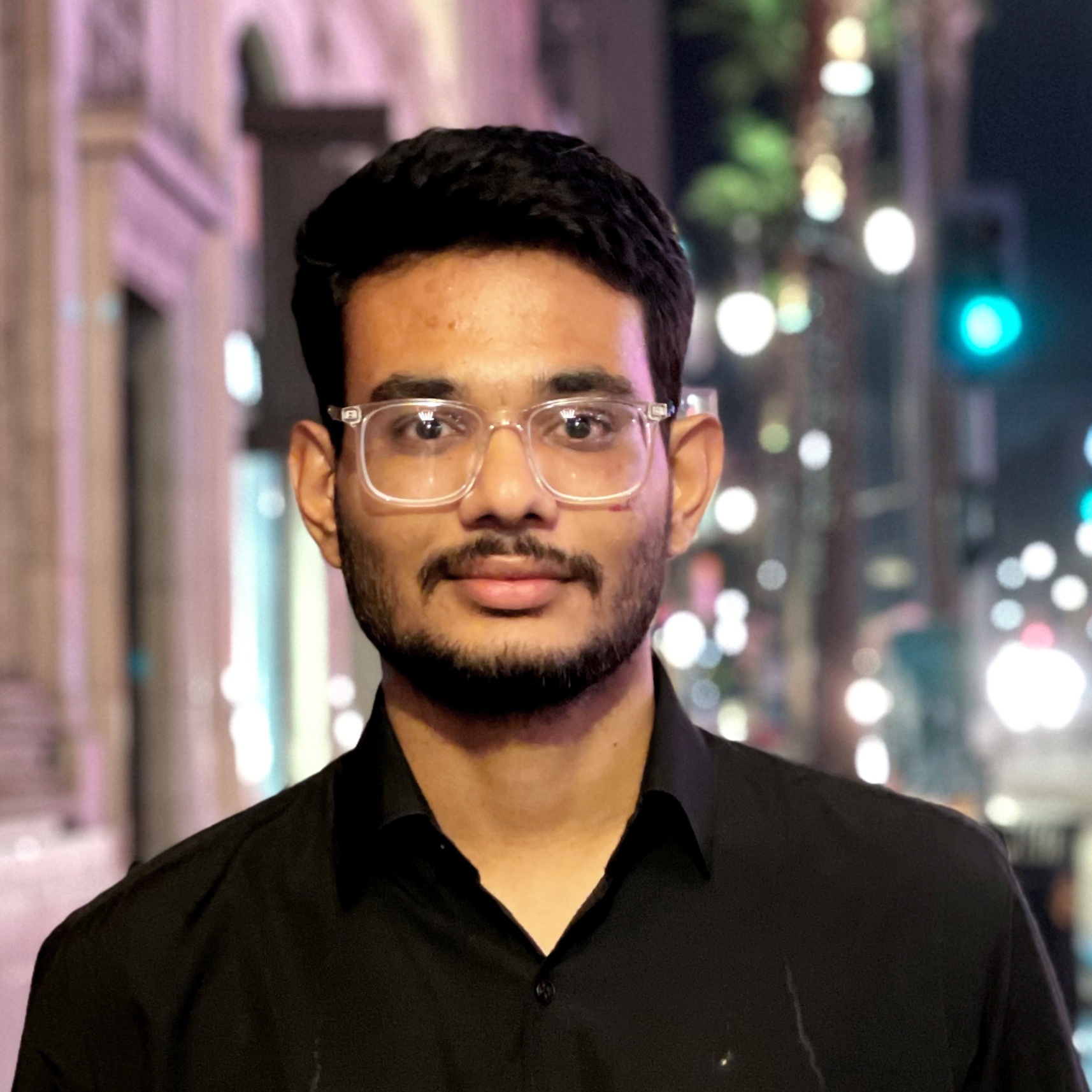 nirmal.jpg Nirmal portrait street lights behind