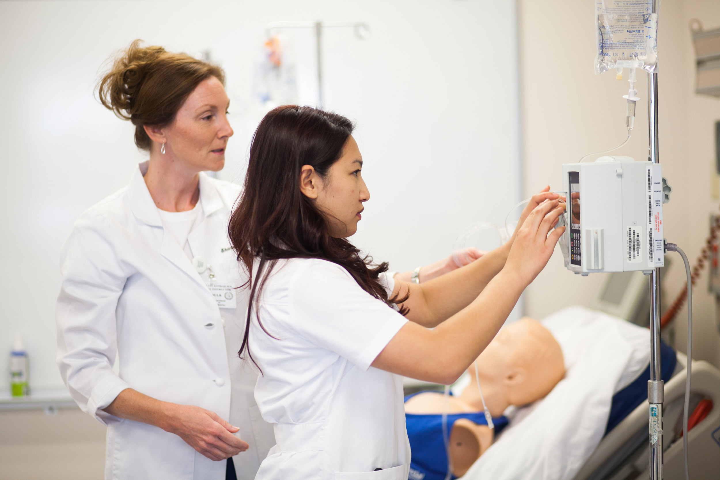 student nurses checking charts