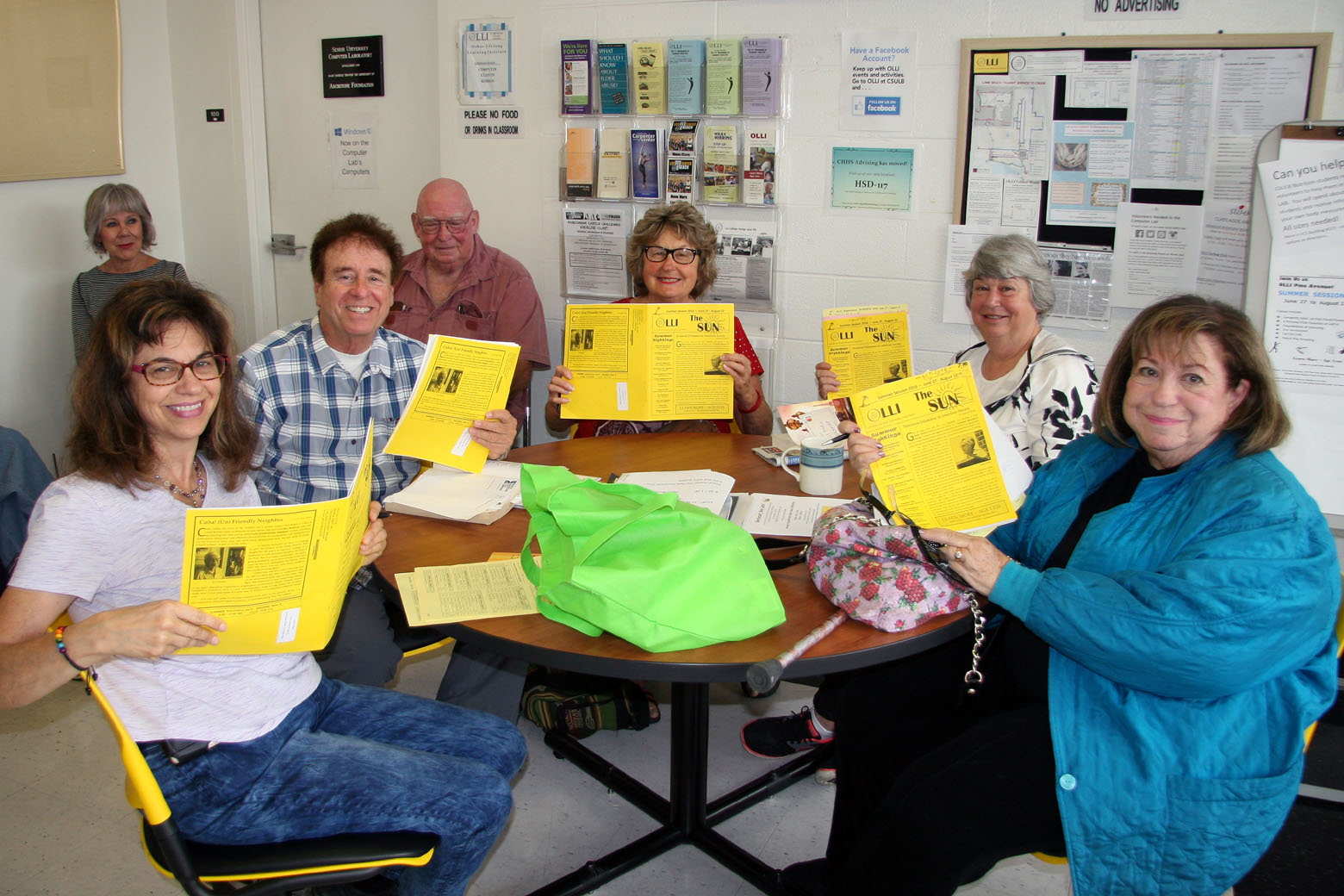 Photo OLLI Members with Registration Books