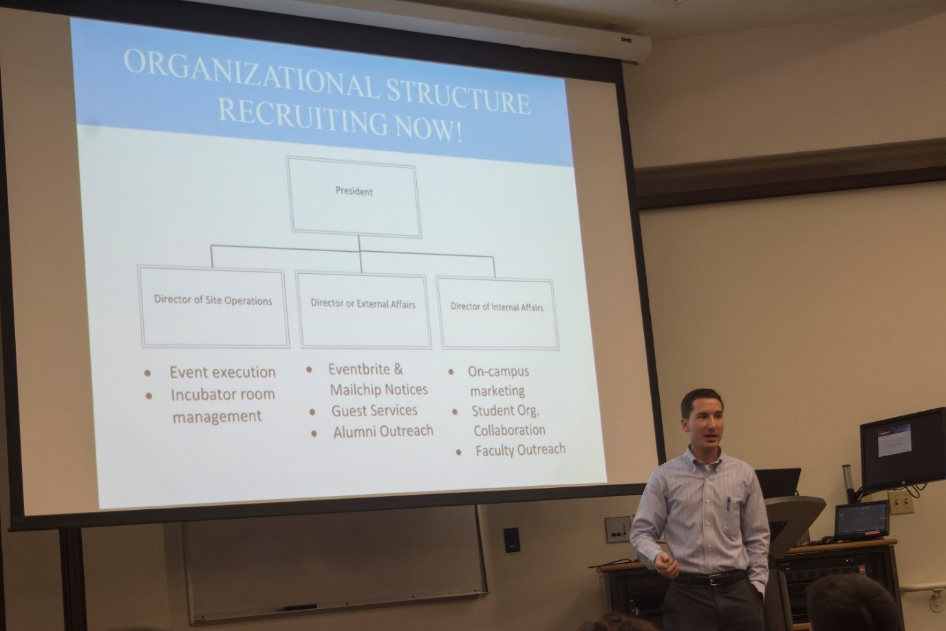 photo_cba_incubator_update.jpg man giving presentation