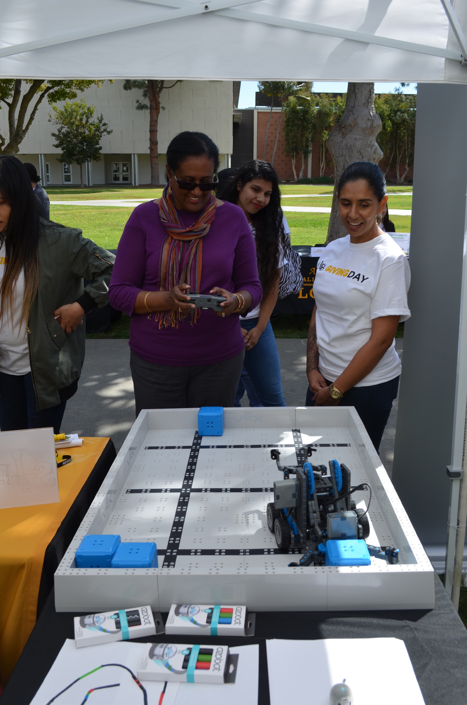 passerby playing with robot