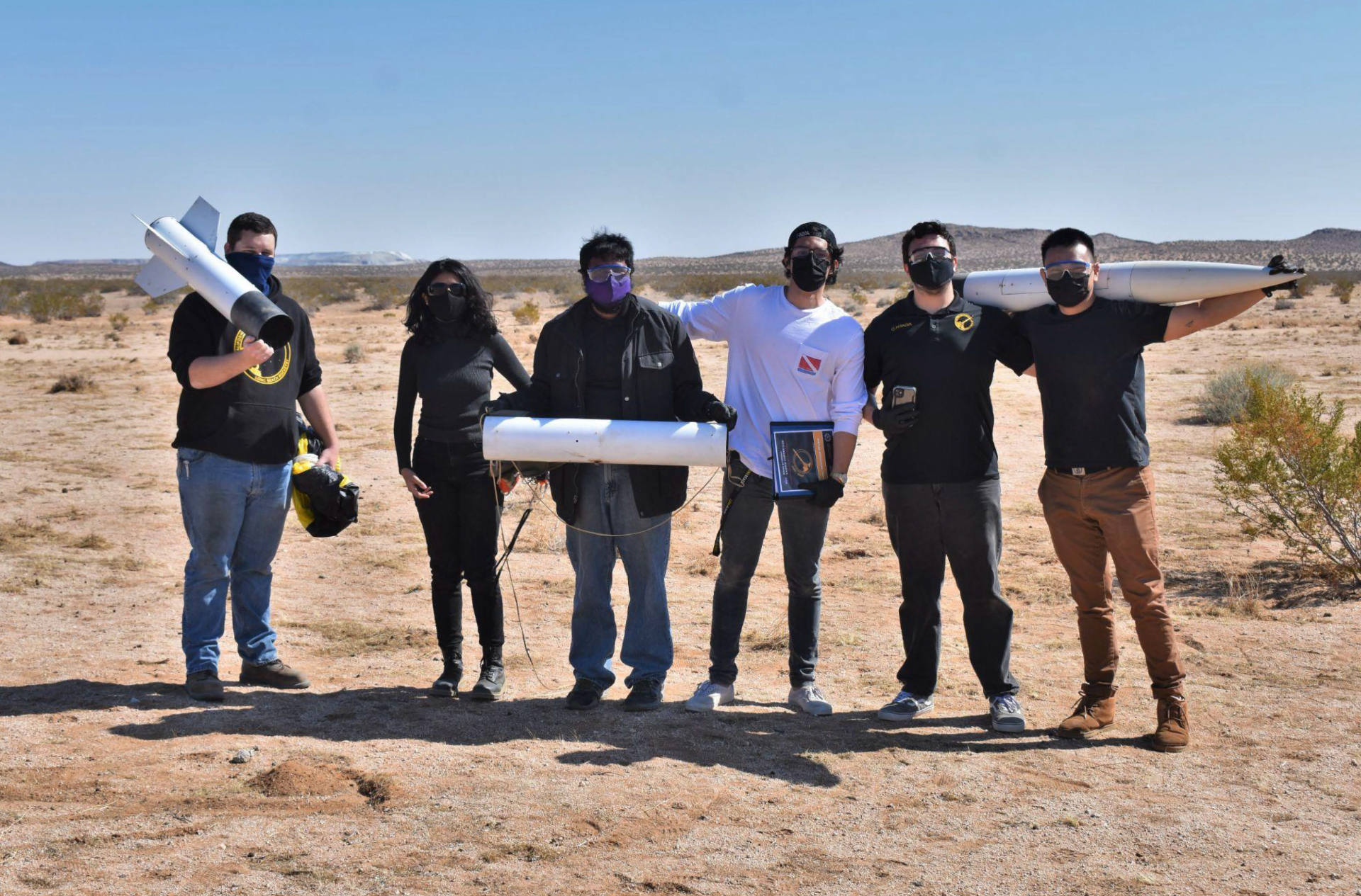 csulb rocketry team holds rocket