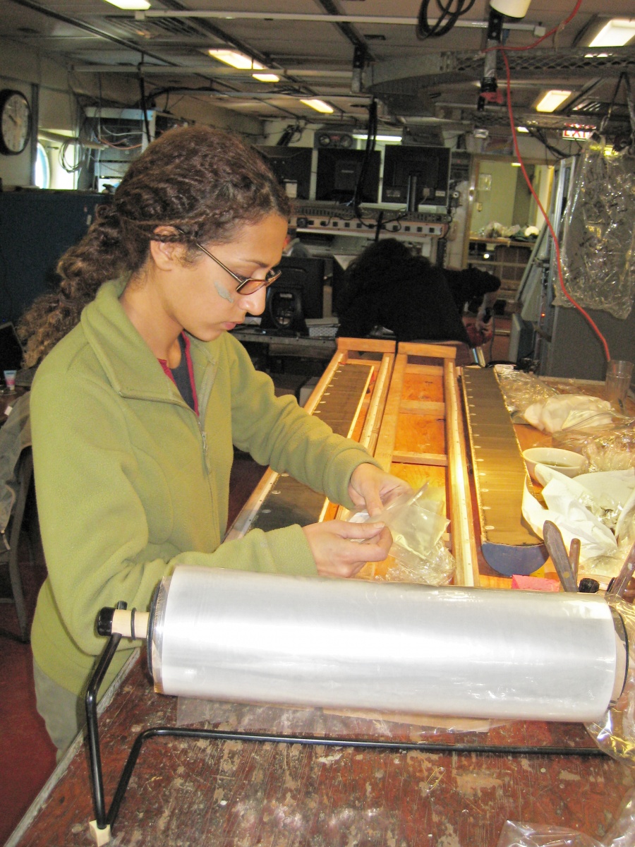 sara_afshar_melville_cruise-behl3.jpg.jpg CSULB master’s student Sara Afshar works on a sediment core.