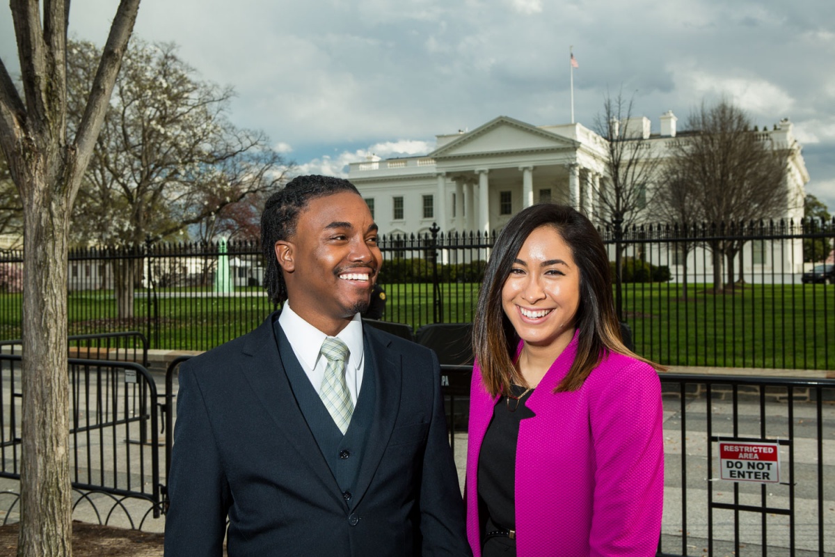 Keyon Anderson and Dominque Vera pose in front of the White 