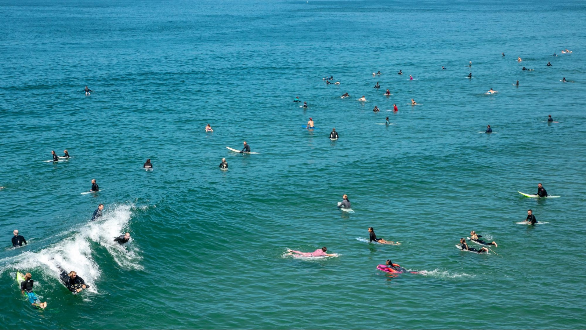 surfers-wave.jpg surfers looking at incoming wave