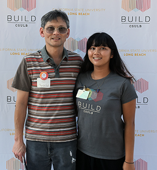 CSULB BUILD Scholar Vivianna Goh poses with her father.