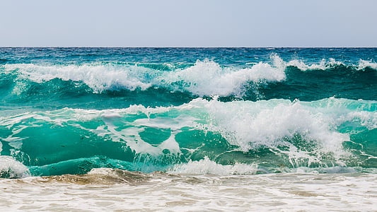 wave crashing near shore