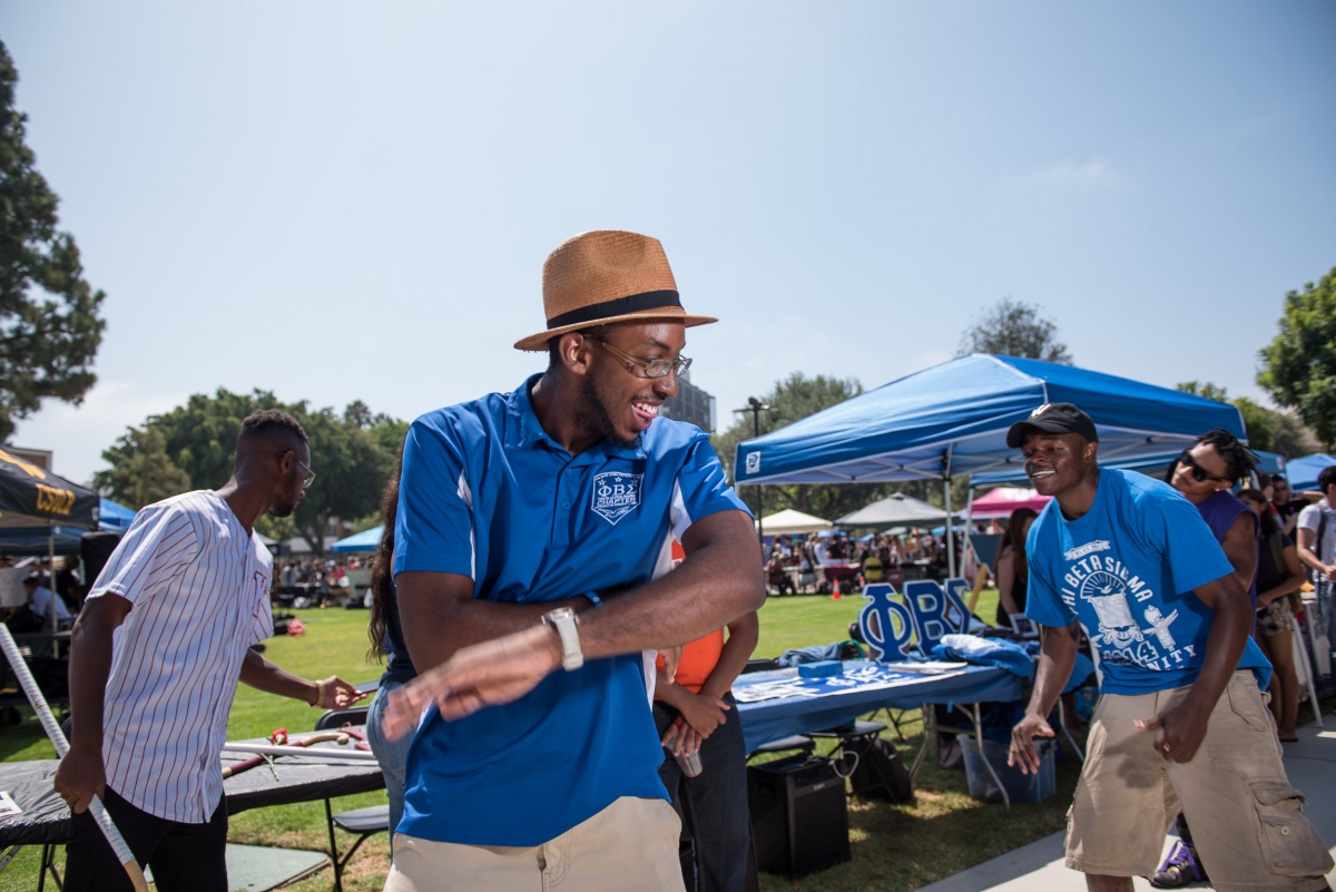 Two dancers show off their step moves during Week of Welcome