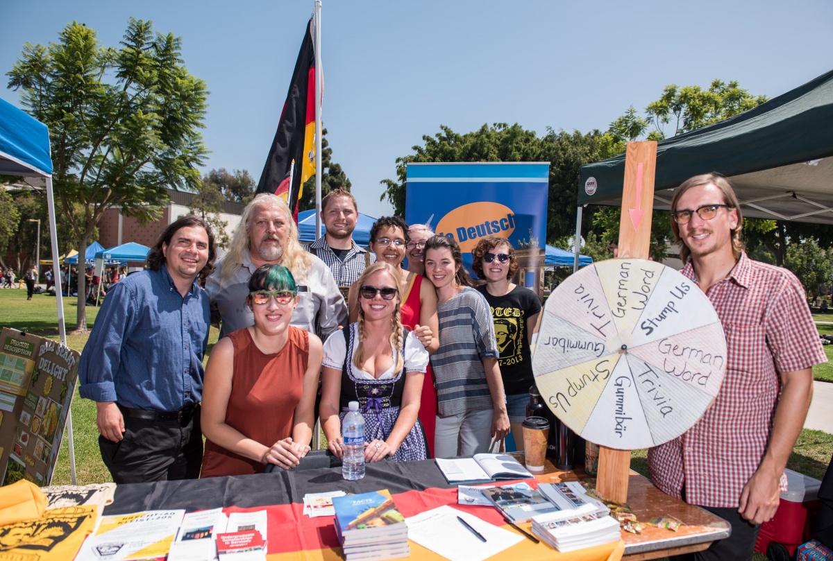 Alumnae Alicia Alderson (center) wears a traditional German 