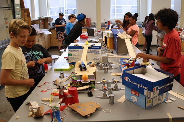 kids building rube goldberg machines