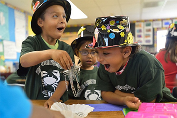 ysc_topic_its_not_magic_its_science.jpg children excited about magnetized paper clips