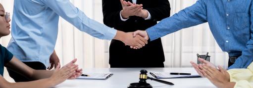 Handshake with Law indicated