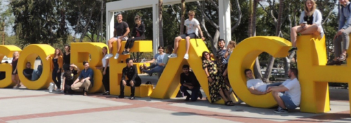 Hamburg HAW CSULB COB 2021 students and professors on Go Beach Sign