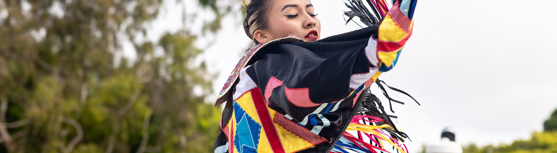Native American woman dancing