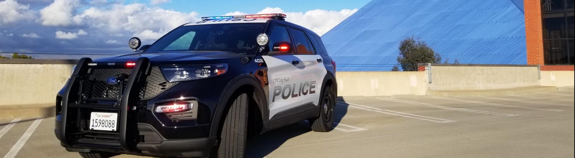 Police Vehicle in front of Pyramid