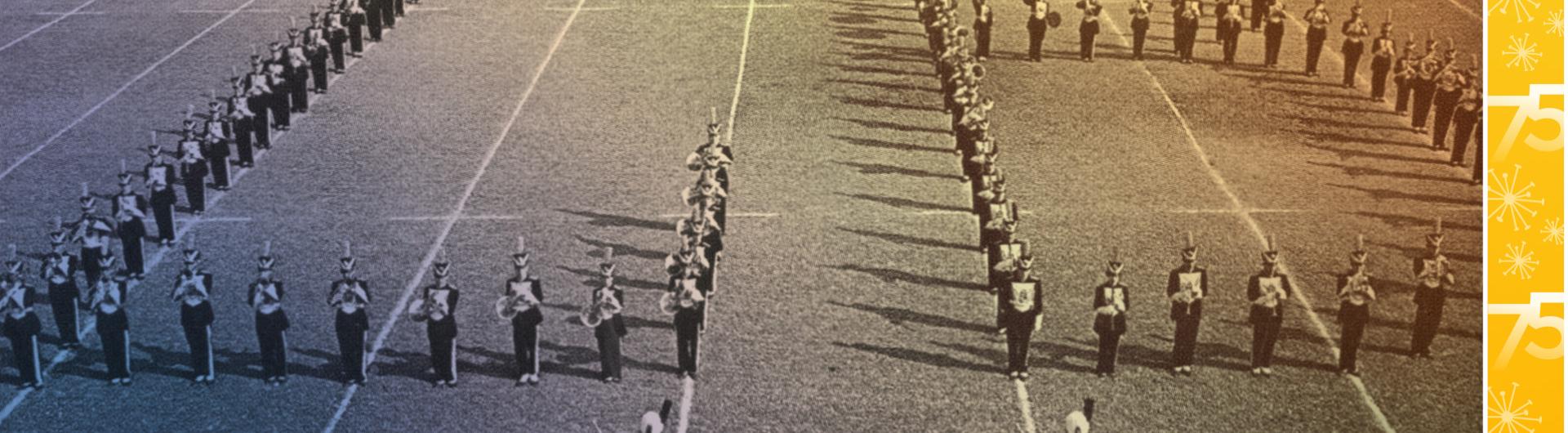 Marching band members in an "LB" formation on a football field