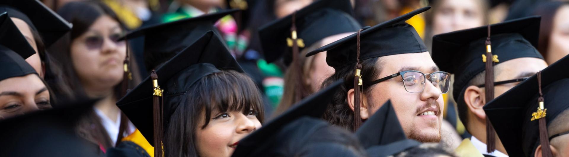 Students listening to speaker at Commencement