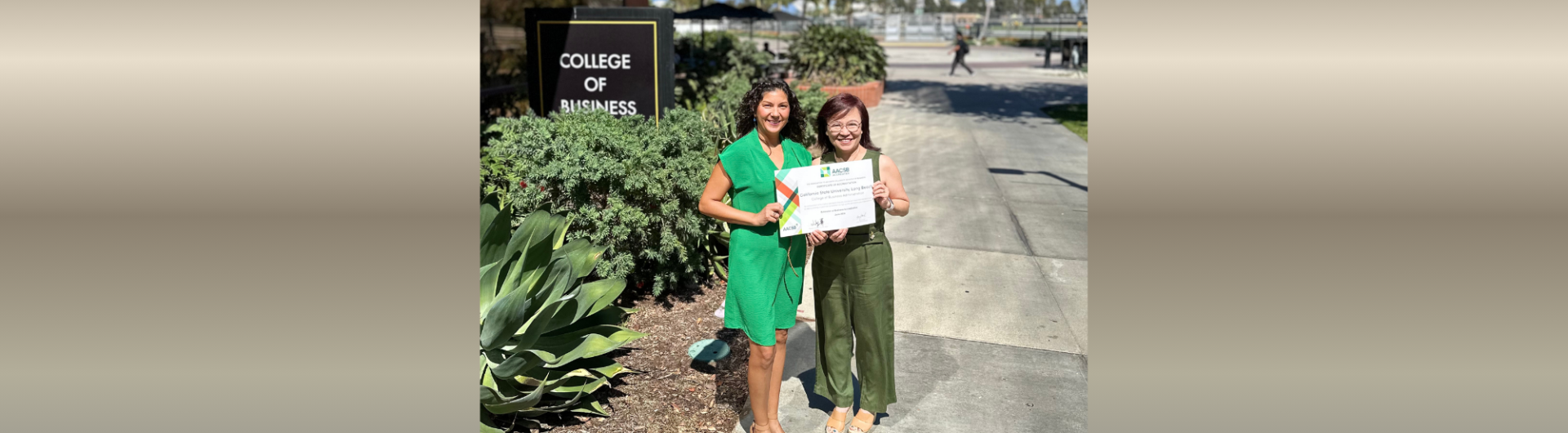 Lizeete and Jasmine representing AACSB certification 2025