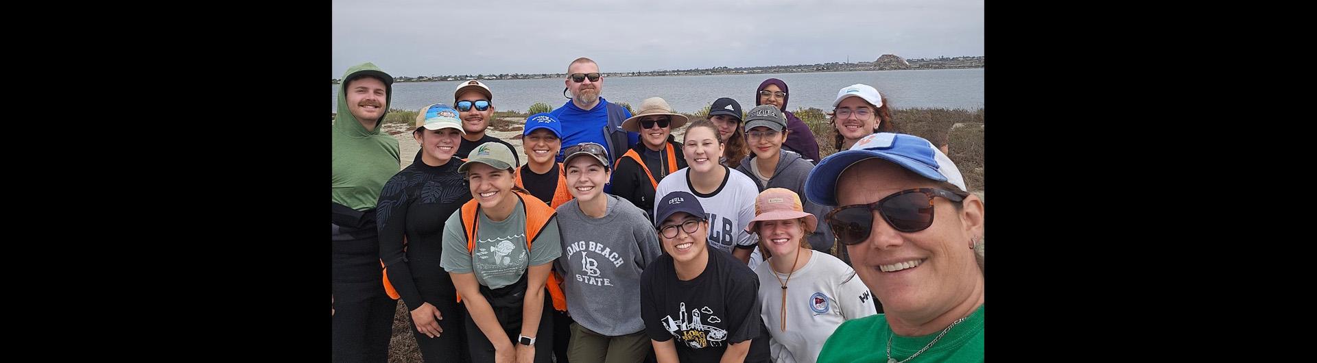 Christine Whitcraft and student researchers in the field