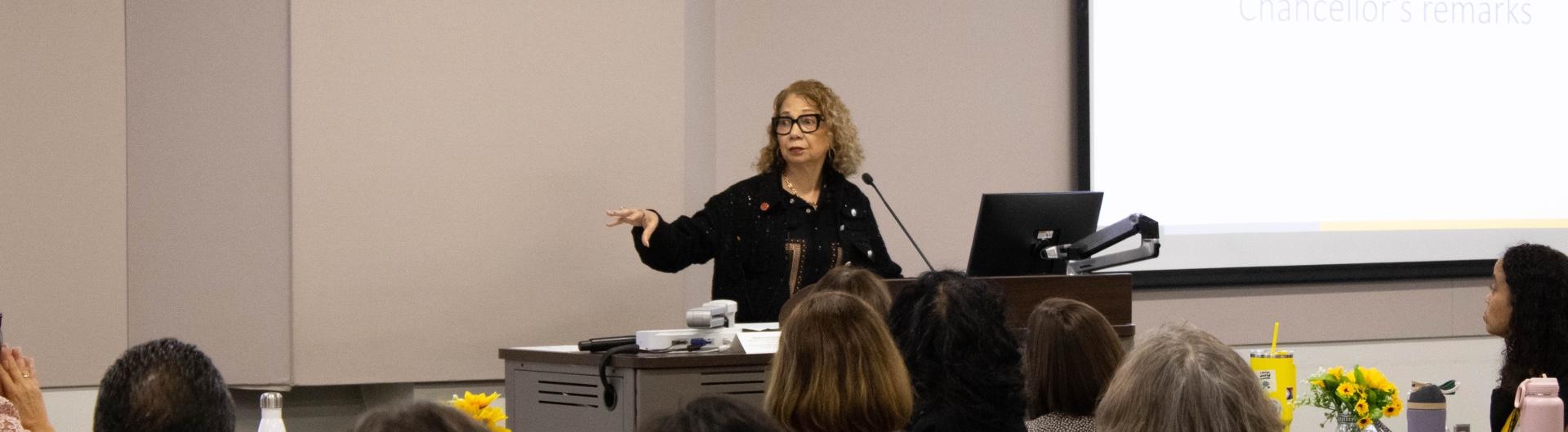 Chancellor Mildred García speaks to faculty and staff in the College of Education.