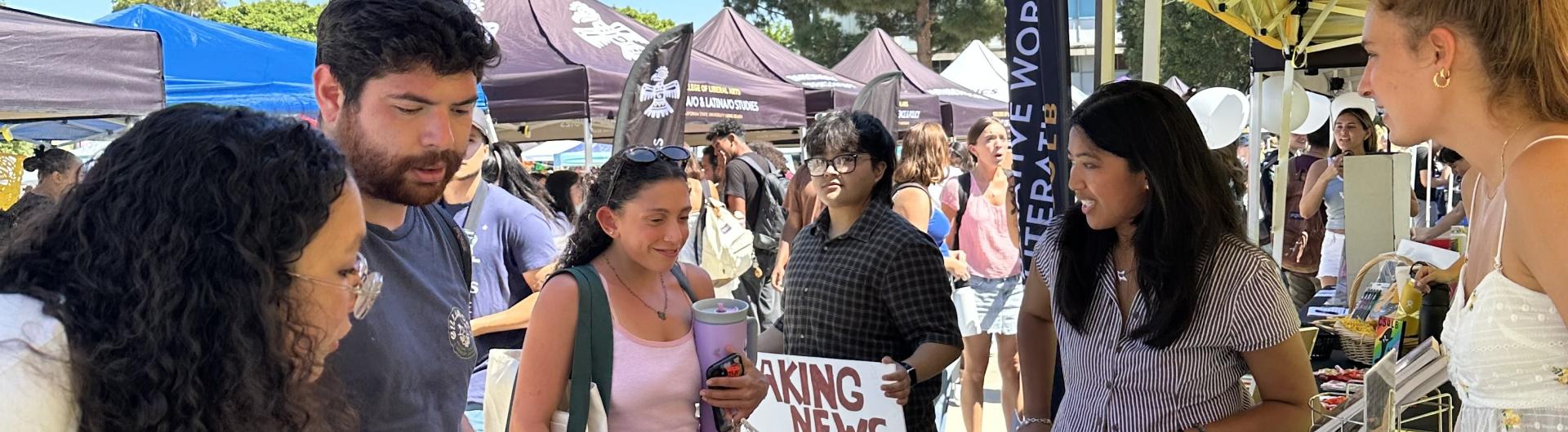 students chatting at a table