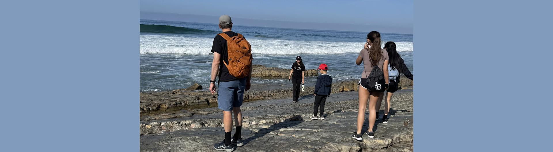 students and mentors exploring tidal pool