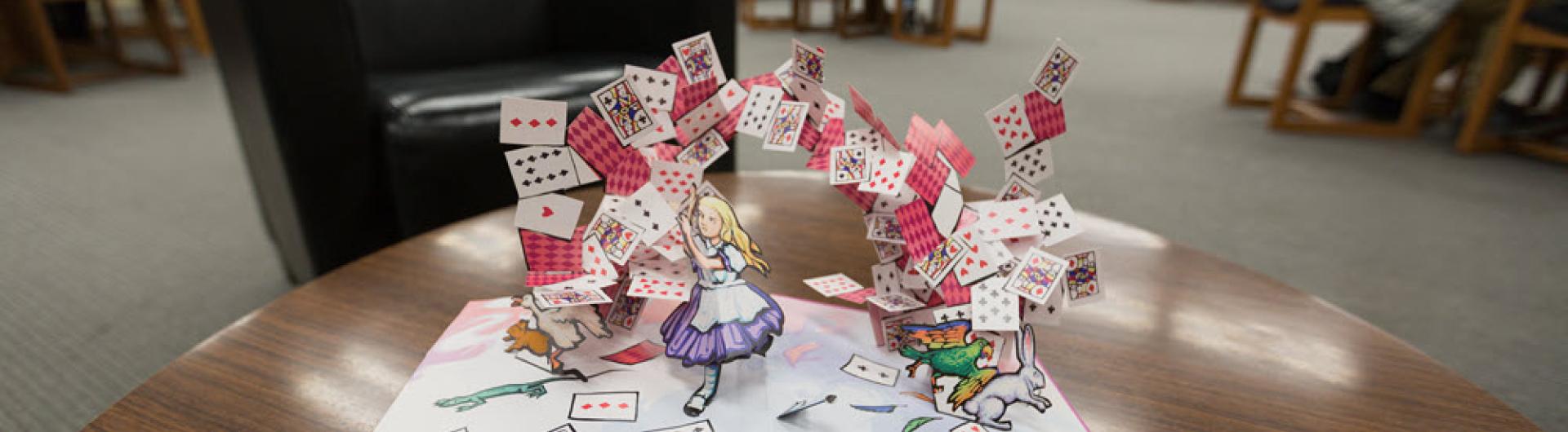 a pop up book of Alice in Wonderland