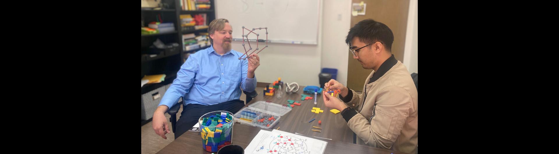 Dr. Ryan Blair and student researcher in the lab