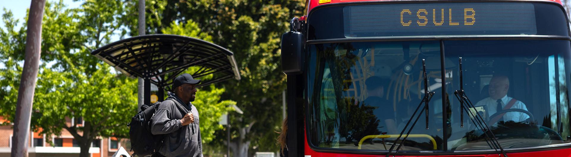 Student boarding a bus