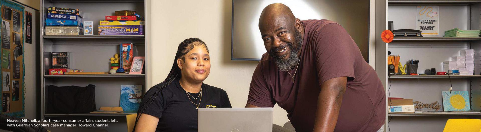 Heaven Mitchell, a fourth-year consumer affairs student, left,  with Guardian Scholars case manager Howard Channel.