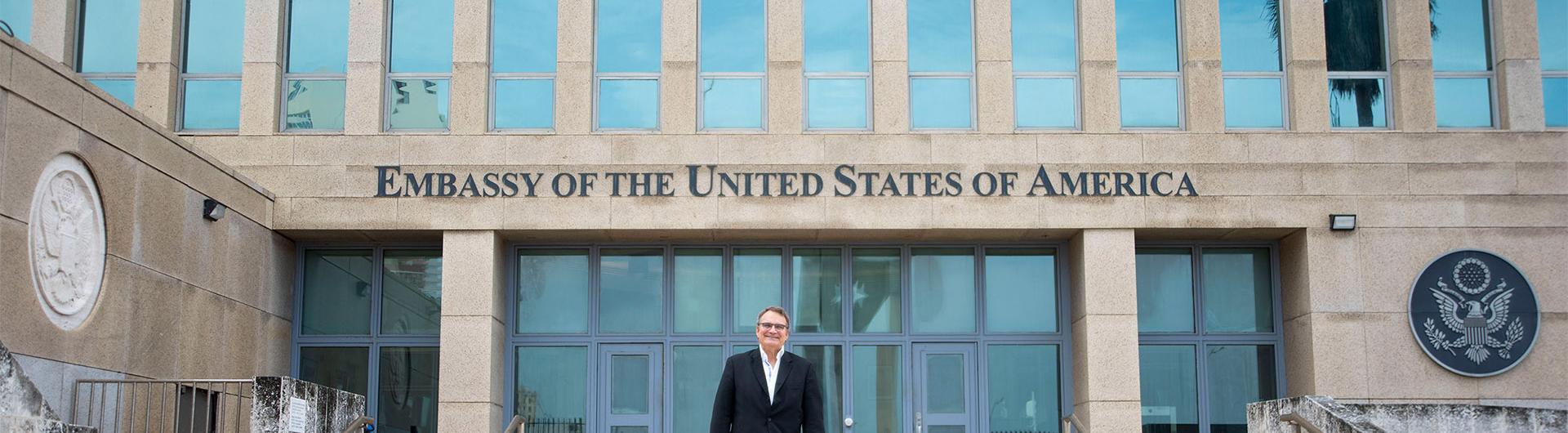 Diplomat Benjamin Ziff standing in front of US embassy in Cuba