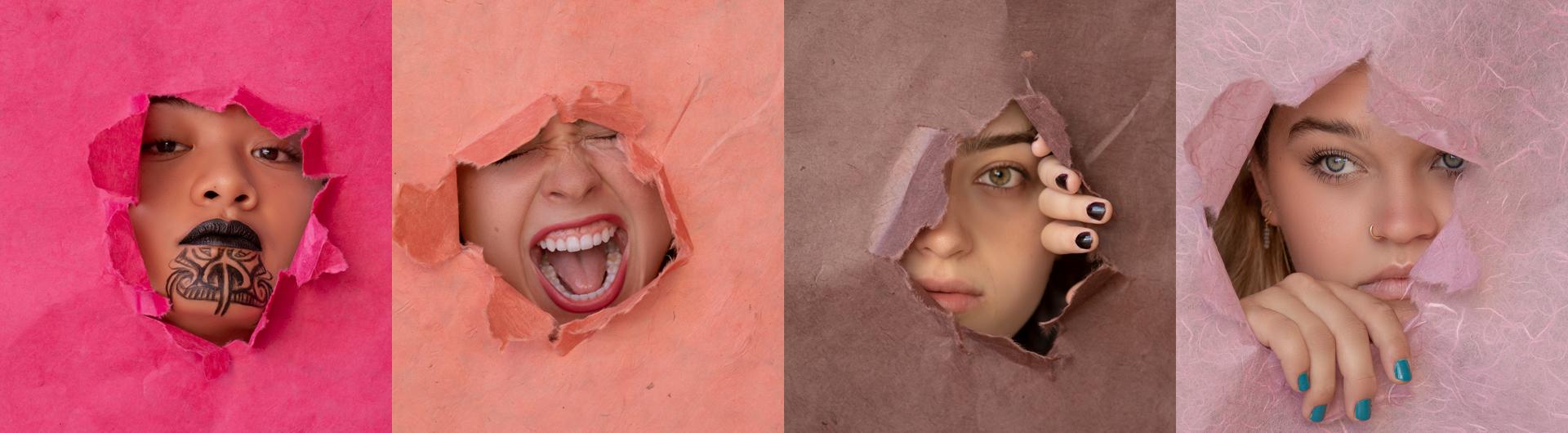 Four pink and brown image blocks with female heads revealed behind a hole in paper.