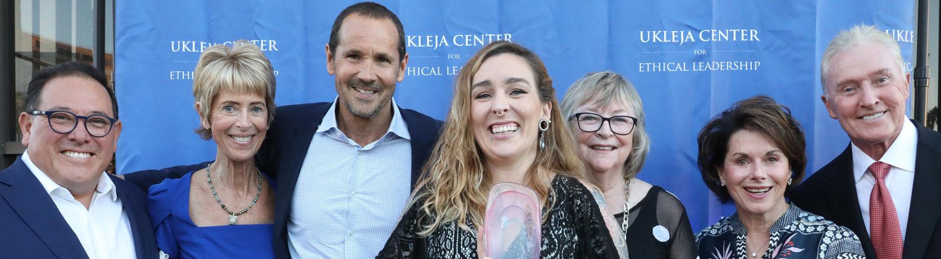 Mark Guillen, Janey Roeder, Greg Wooden, Taryn Williams, Jane Close Conoley, Louise Ukleja and Mick Ukleja at presentation of the 2022 Nell and John Wooden Ethics in Leadership Award