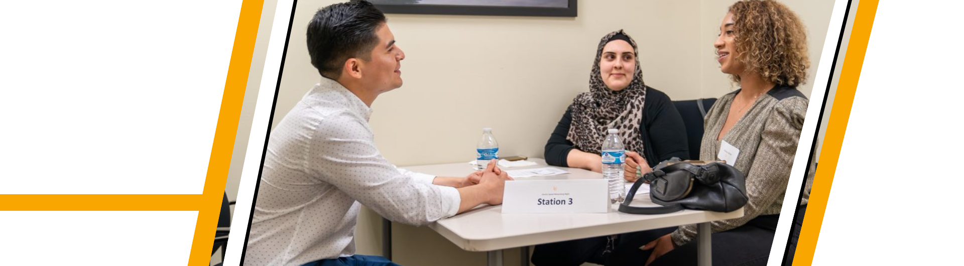 picture of student talking with professionals