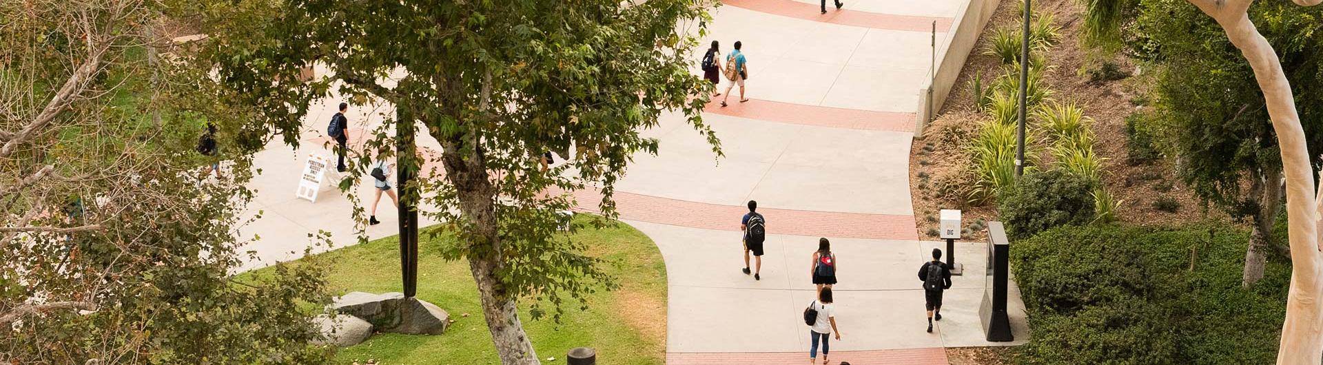 Aerial view of students walking across campus