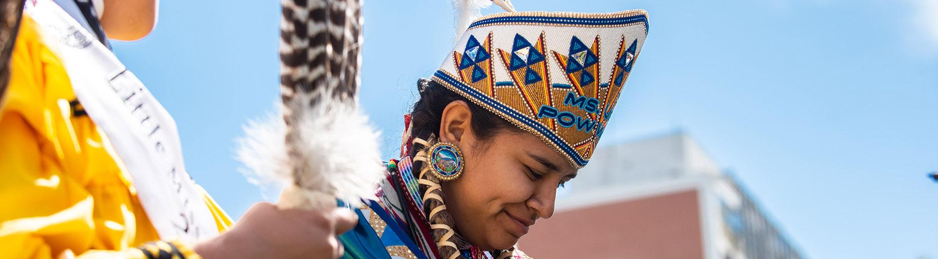A woman dressed in Native American attire