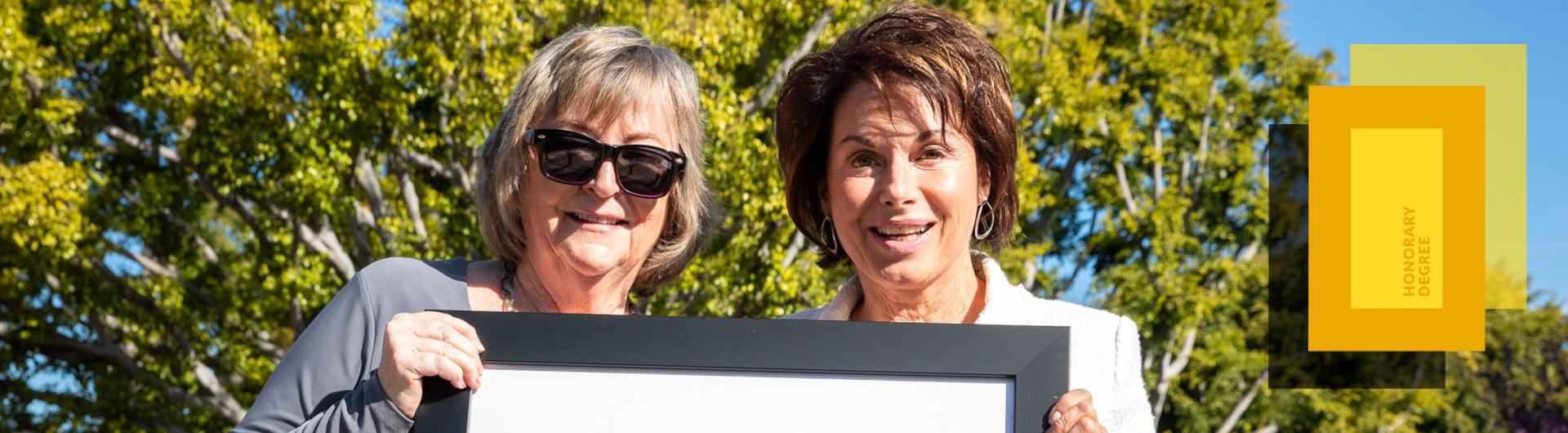 Jane Close Conoley and Louise Ukleja hold photo