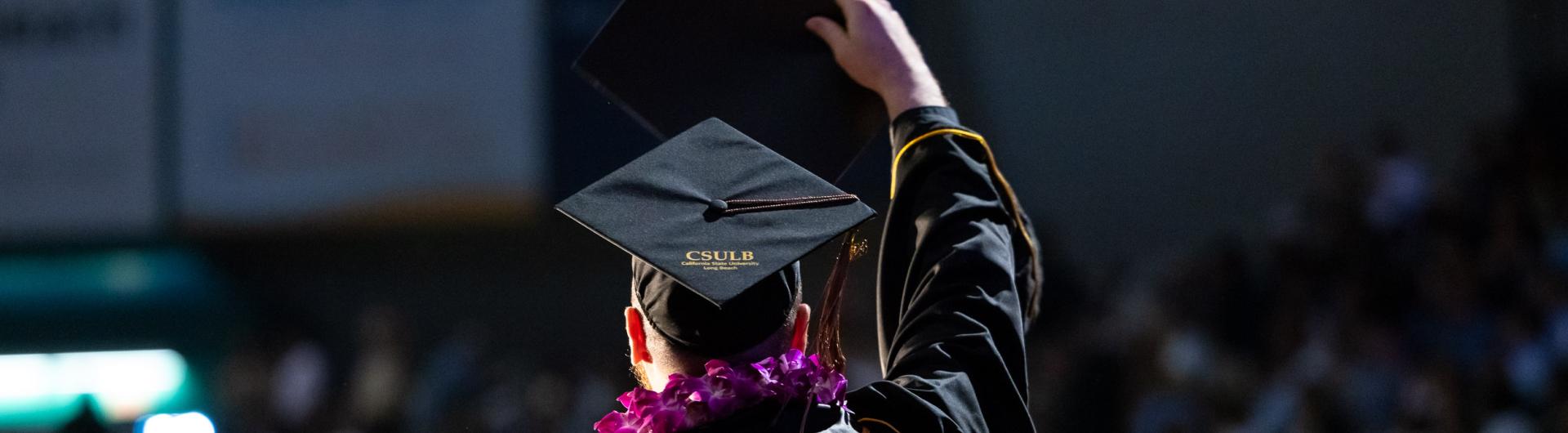 Graduating student facing crowd