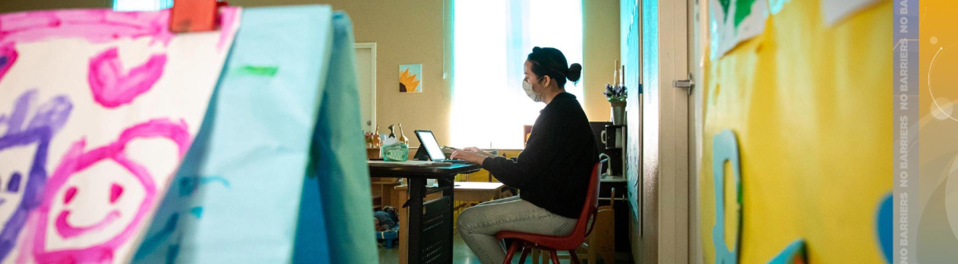 Teacher sitting in a classroom