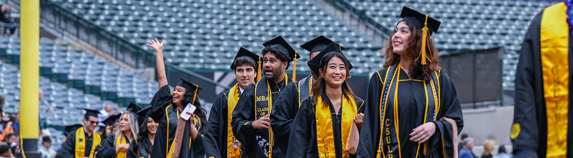 CSULB graduates celebrating their commencement ceremony